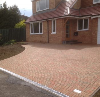 Strong-Base Driveway & Landscaping
